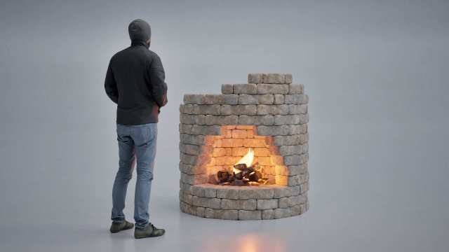 Fire Keep premium round firepit with arched opening with man for scale