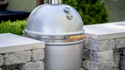 Kamado Grill Island with natural stone countertops.