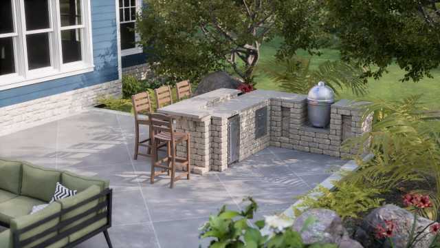 Compact L-shaped outdoor kitchen with versatile Kamado grill and bar seating, designed for grilling, smoking, and baking.