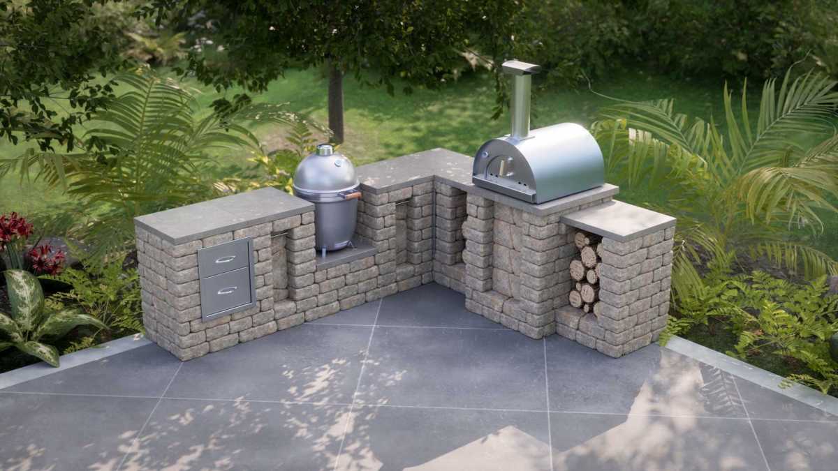 Traditional L-shaped wood-fired outdoor kitchen with Kamado smoker, pizza oven, and storage, perfect for classic cooking enthusiasts.