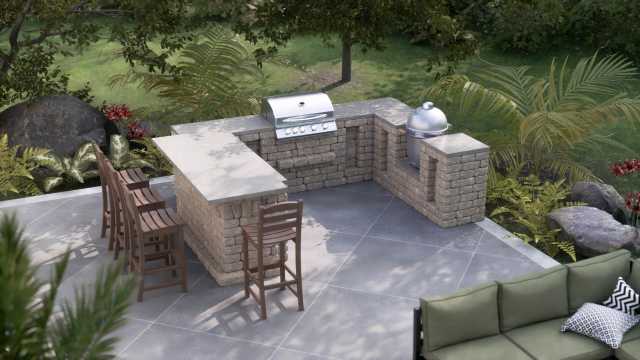 U-shaped outdoor kitchen idea with Kamado grill, gas grill, and extra space for smoking BBQ and entertaining guests.