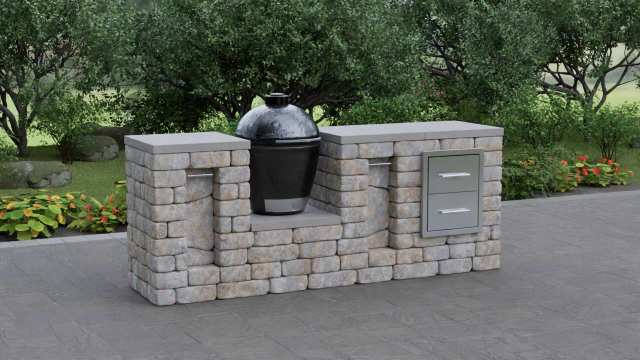 Unity outdoor kitchen module with Kamado smoker grill, limestone countertops, and storage drawer
