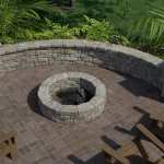 Outdoor fire pit and stone seat wall.